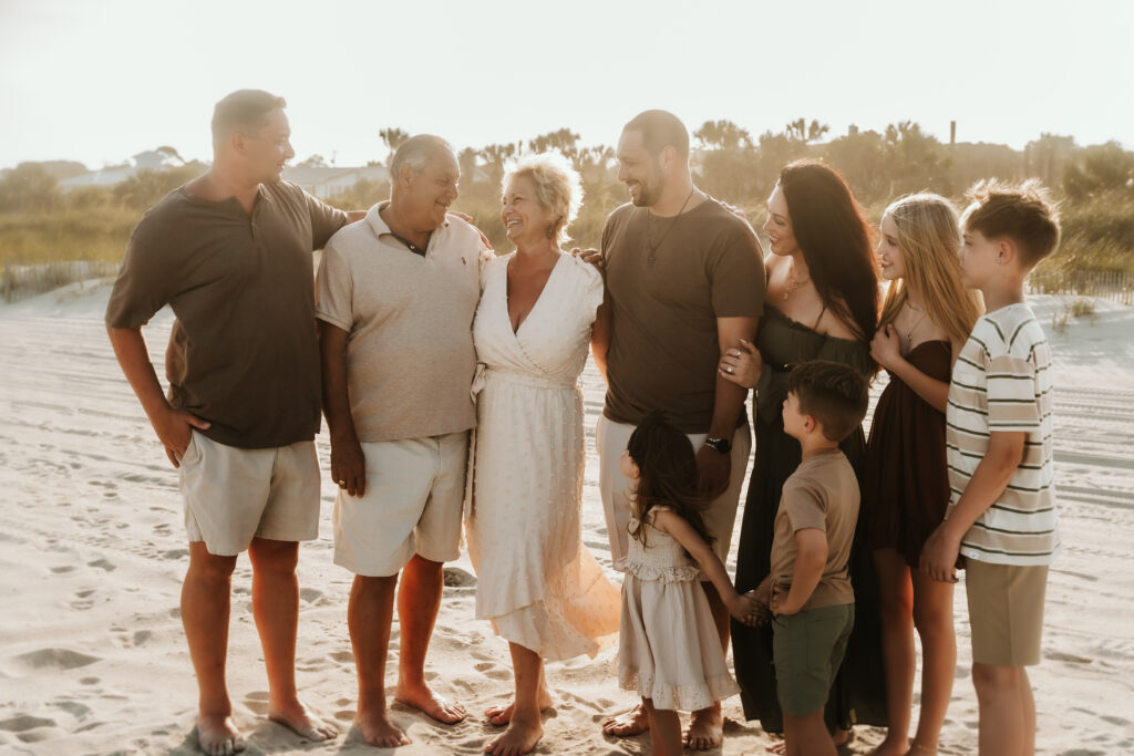  Extended family group photo in beach dunes at Isle of Palms SC during sunset by Moody Momma photographer