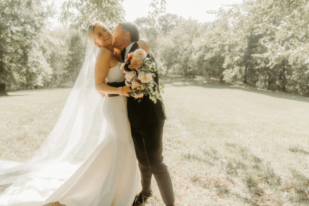 Bride and groom under Spanish moss at Boone Hall Plantation – Charleston wedding photographer Moody Momma