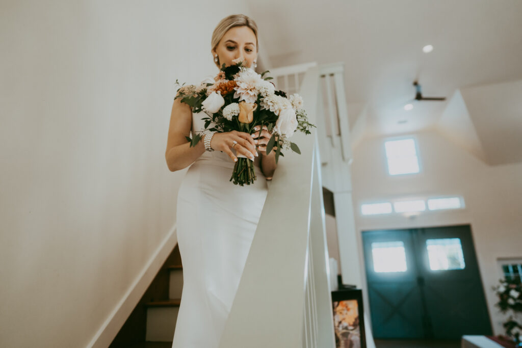 Bride and groom sharing a quiet moment during their Charleston, SC wedding captured by Moody Momma Photographer